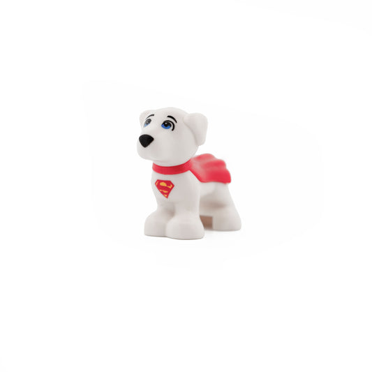 White Dog, Small Super Hero with Blue Eyes, Red Cape and Superman 'S' Logo Pattern (Krypto)